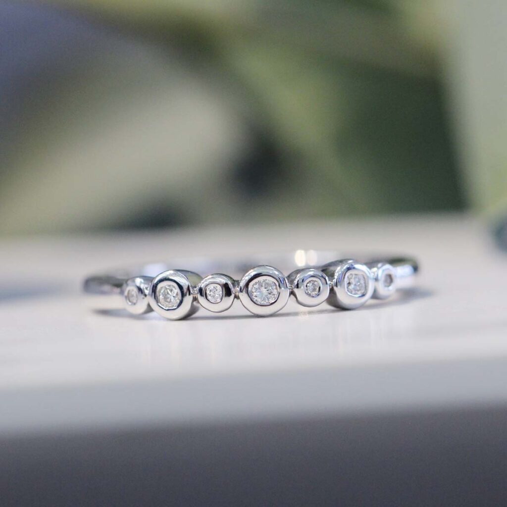 Funky asymmetrical wedding ring style, perfect for unique tastes.