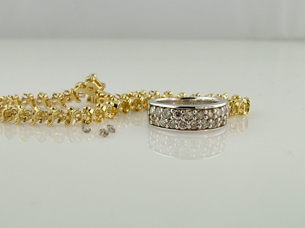 Broken tennis bracelet reset into a pave diamond wedding band before and after