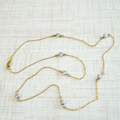 Gold wedding band turned into necklace