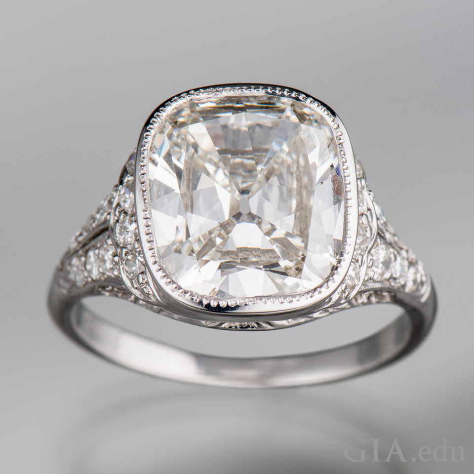 Old Mine Cut diamond engagement ring with antique-style setting